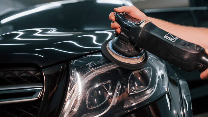 A close-up photo of a car's front bumper with transparent PPF applied, demonstrating its invisible protection.