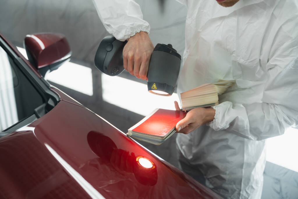 Side-by-side comparison of a car's paint before and after ceramic coating.